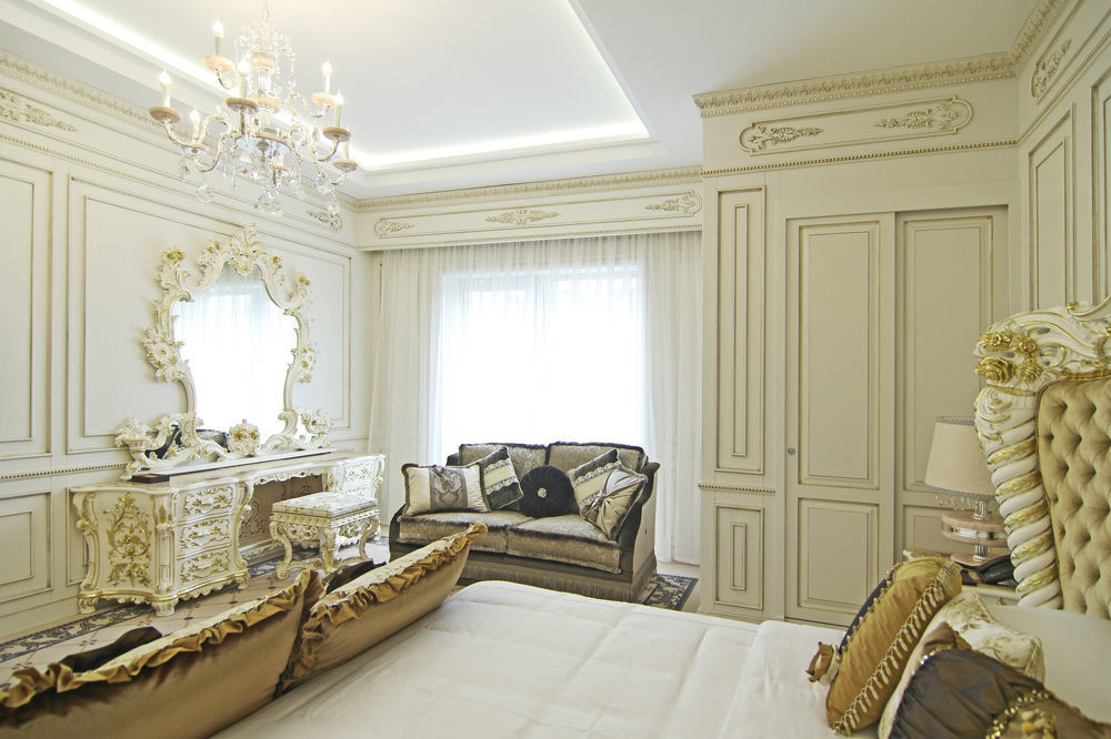 Orion Hotel บิชเคก ภายนอก รูปภาพ A bedroom
