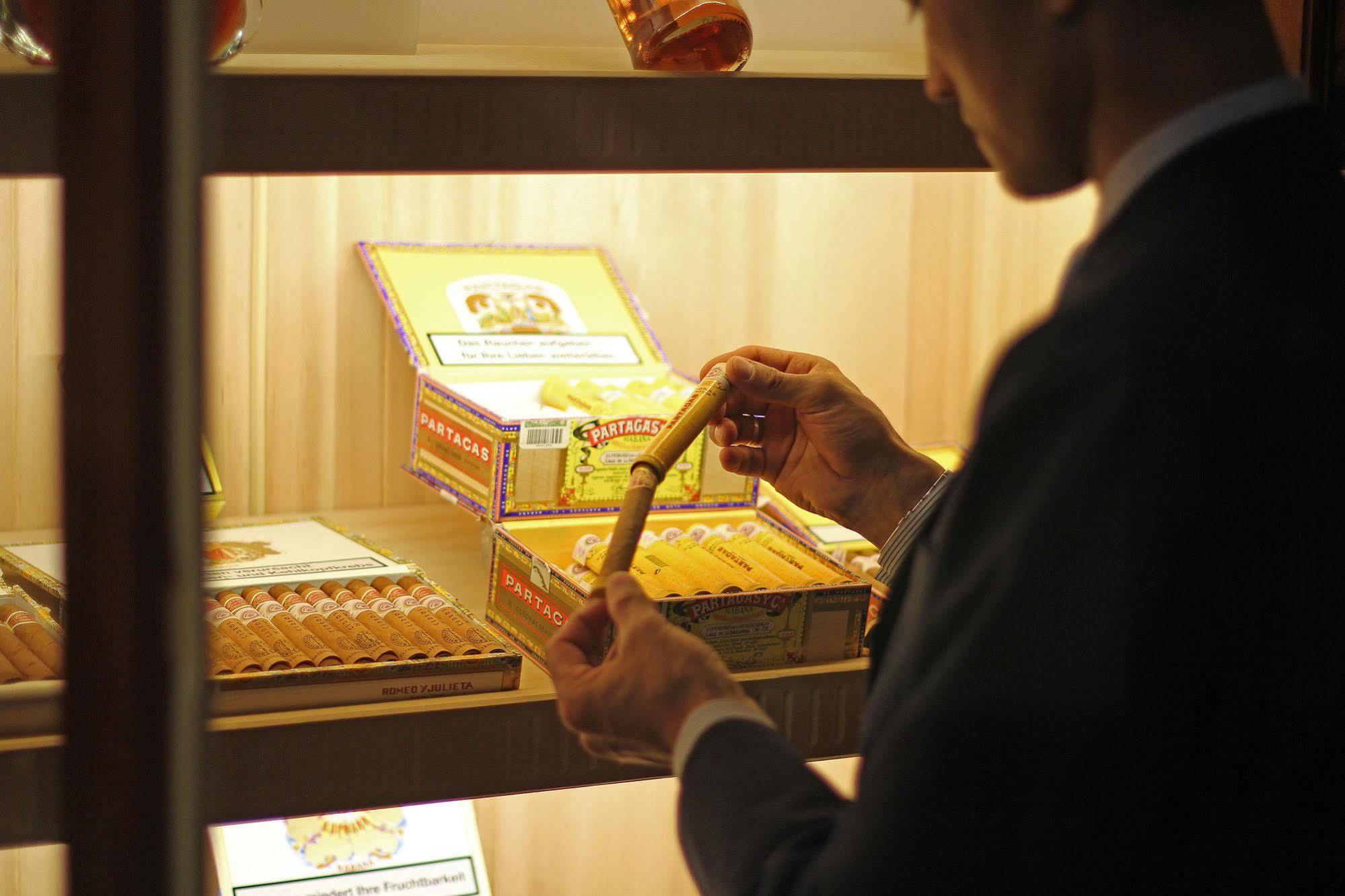 Orion Hotel บิชเคก ภายนอก รูปภาพ A cigar shop in Madrid, Spain
